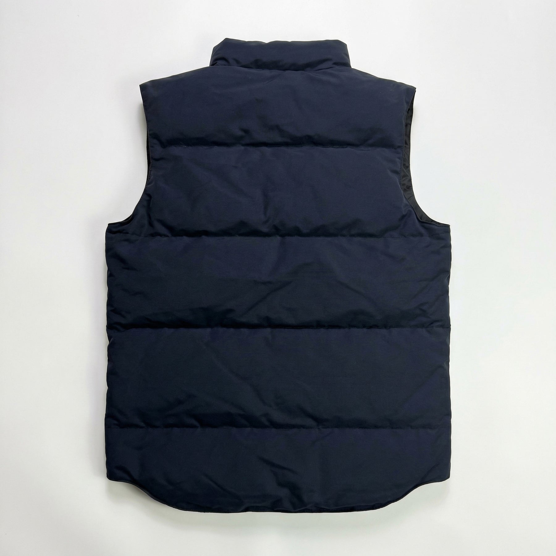 CG Gilet Red logo