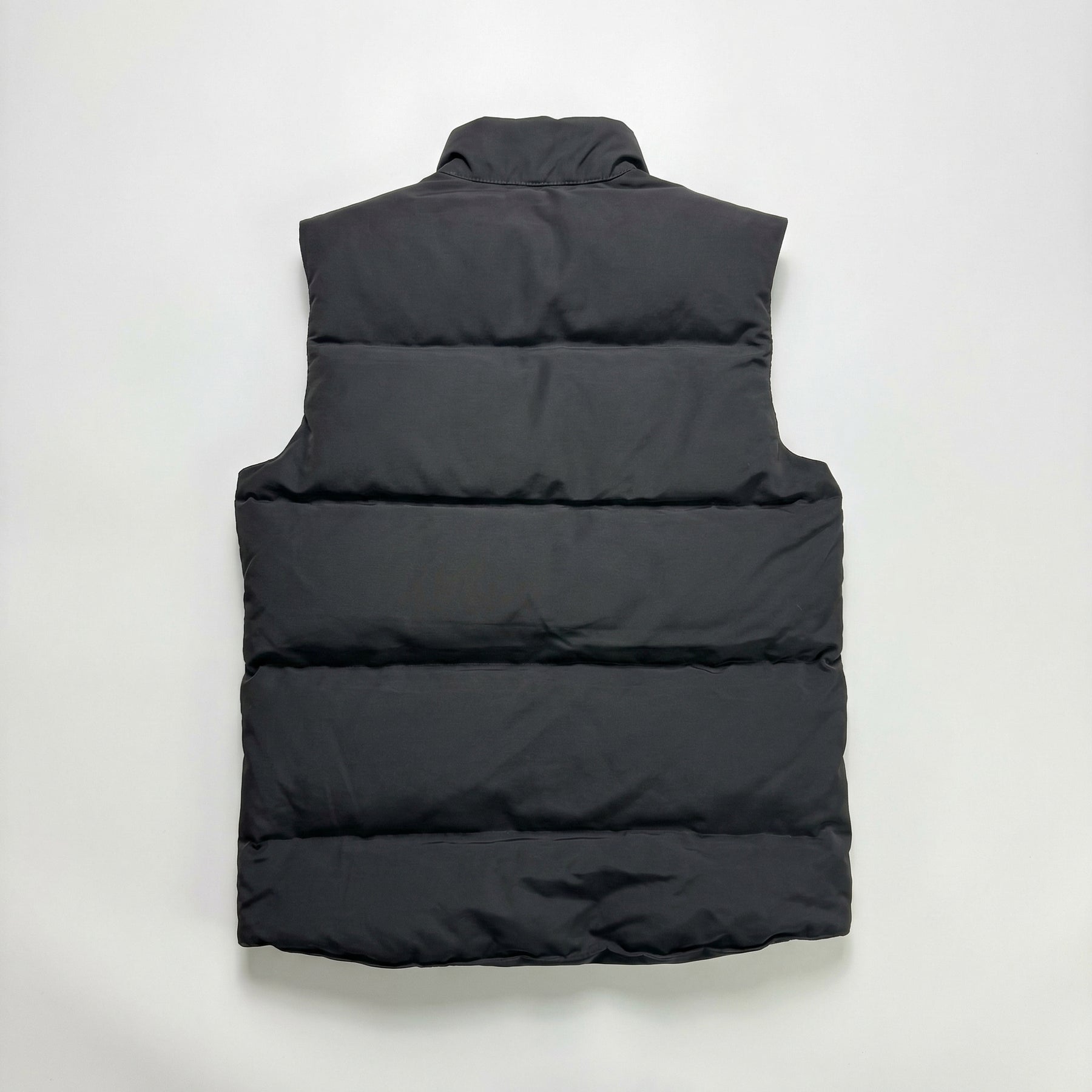 CG Gilet Red logo